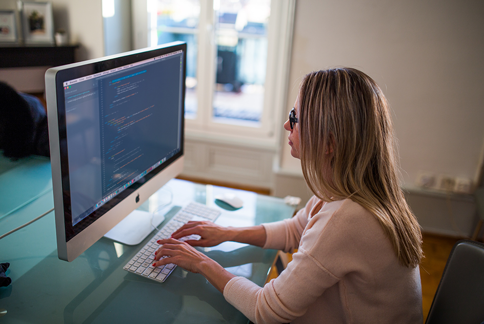 Worker on computer at desk